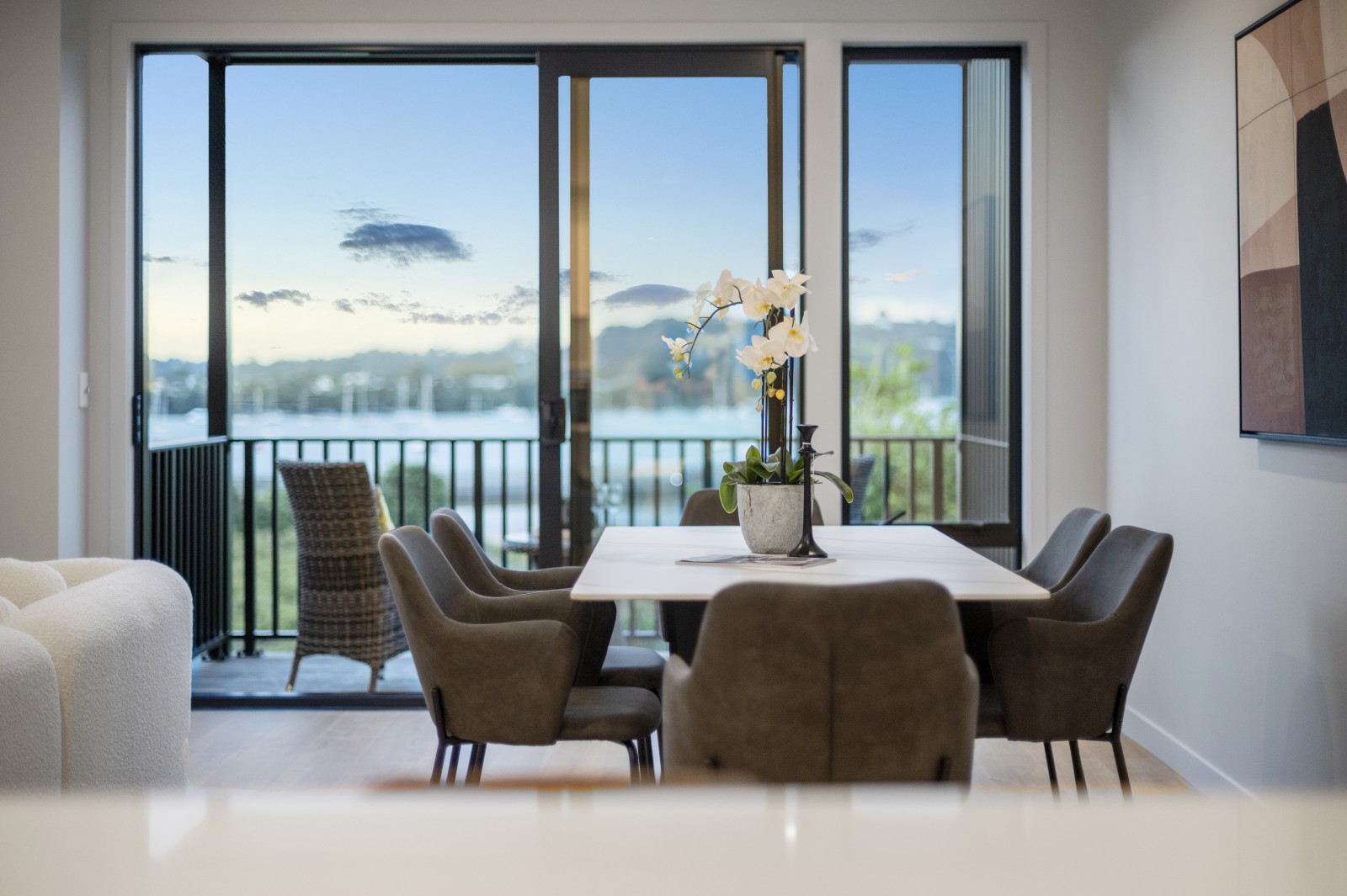 Classic Builders Hobsonville Point beauty shot. Dining looking over water   Jev Matt
