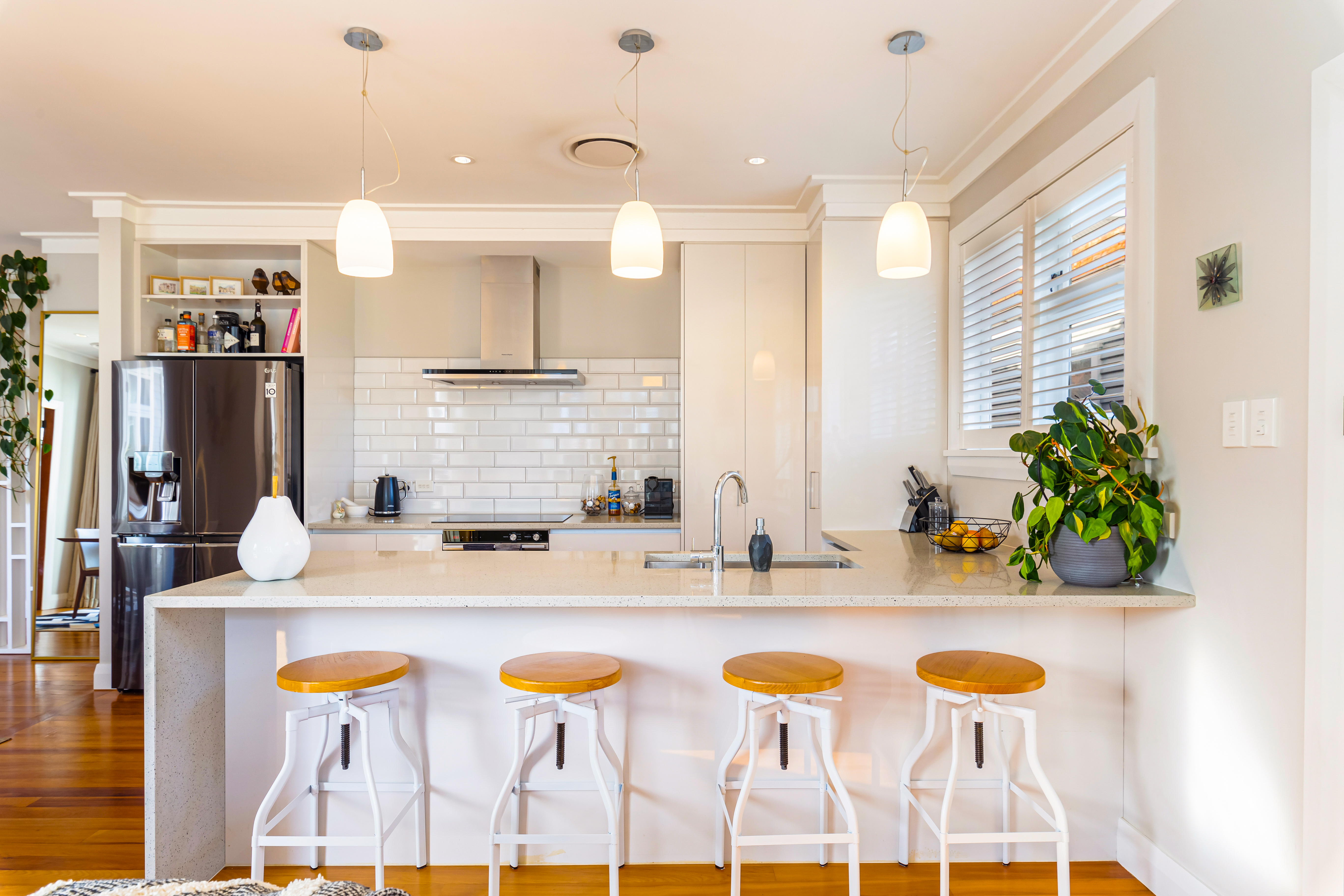 Contemporary kitchen with expansive island breakfast bar Hobsonville Point Jev Matt v2