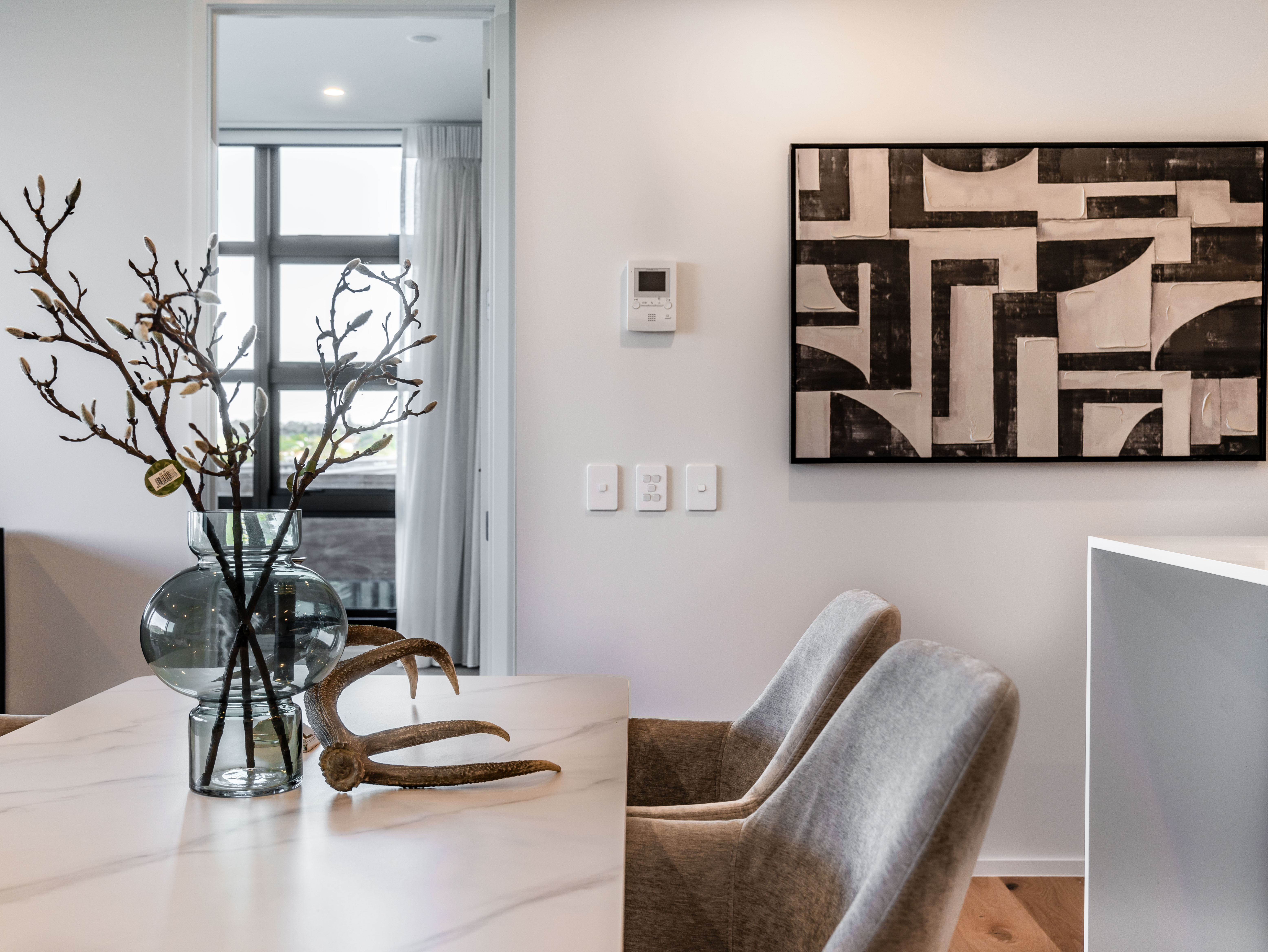 Dining room in a Willis Bond property Hobsonville Point   Jev Matt