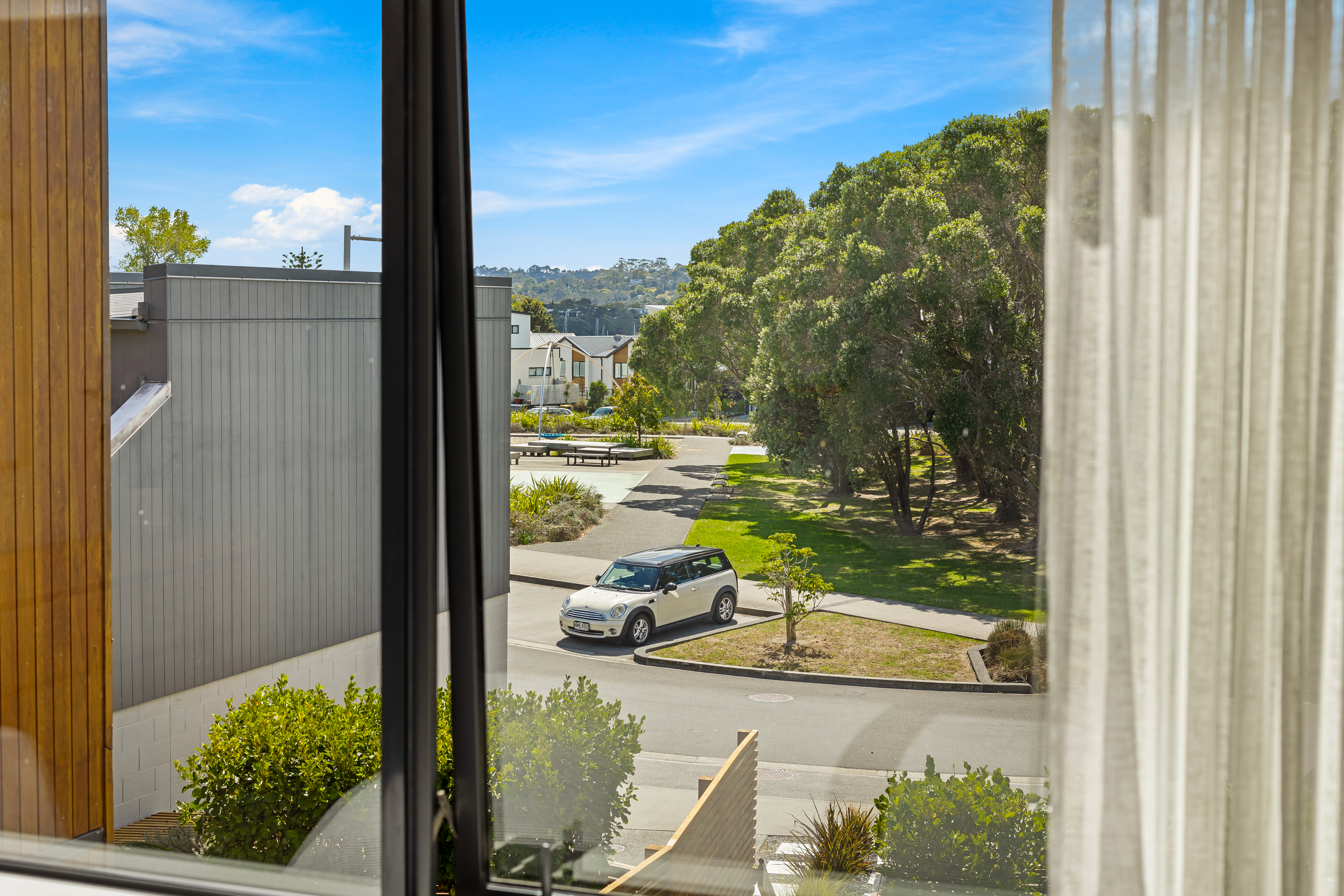 Elevated 2nd floor outlook across neighbouring parkland Hobsonville Jev Matt.jpg