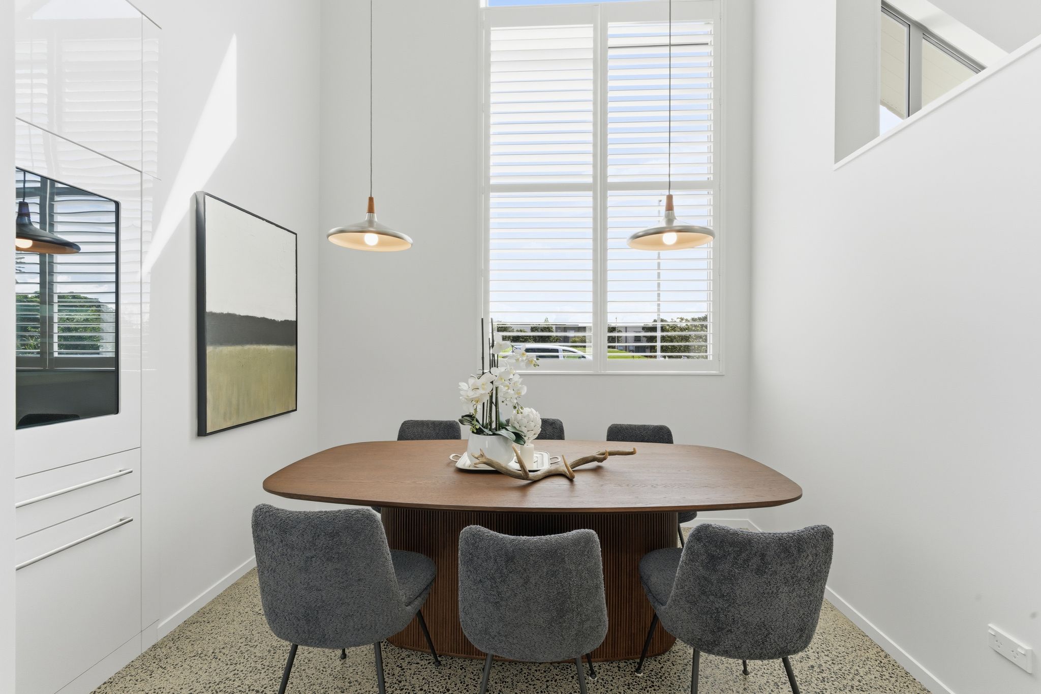 Jalcon Light filled dining area with feature window Hobsonville Point Jev Matt.jpg