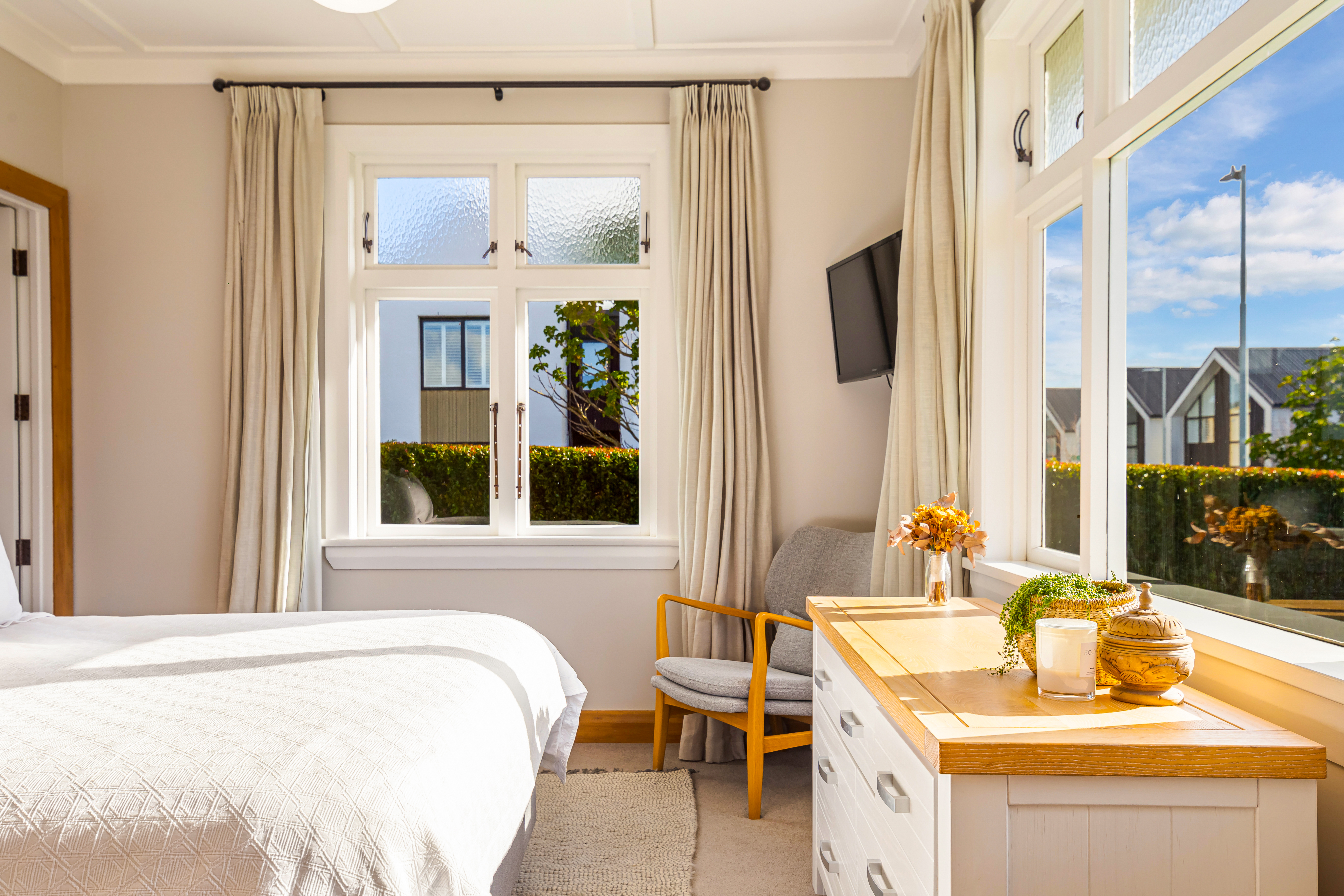 Peaceful bedroom with original heritage windows Hobsonville Point Jev Matt