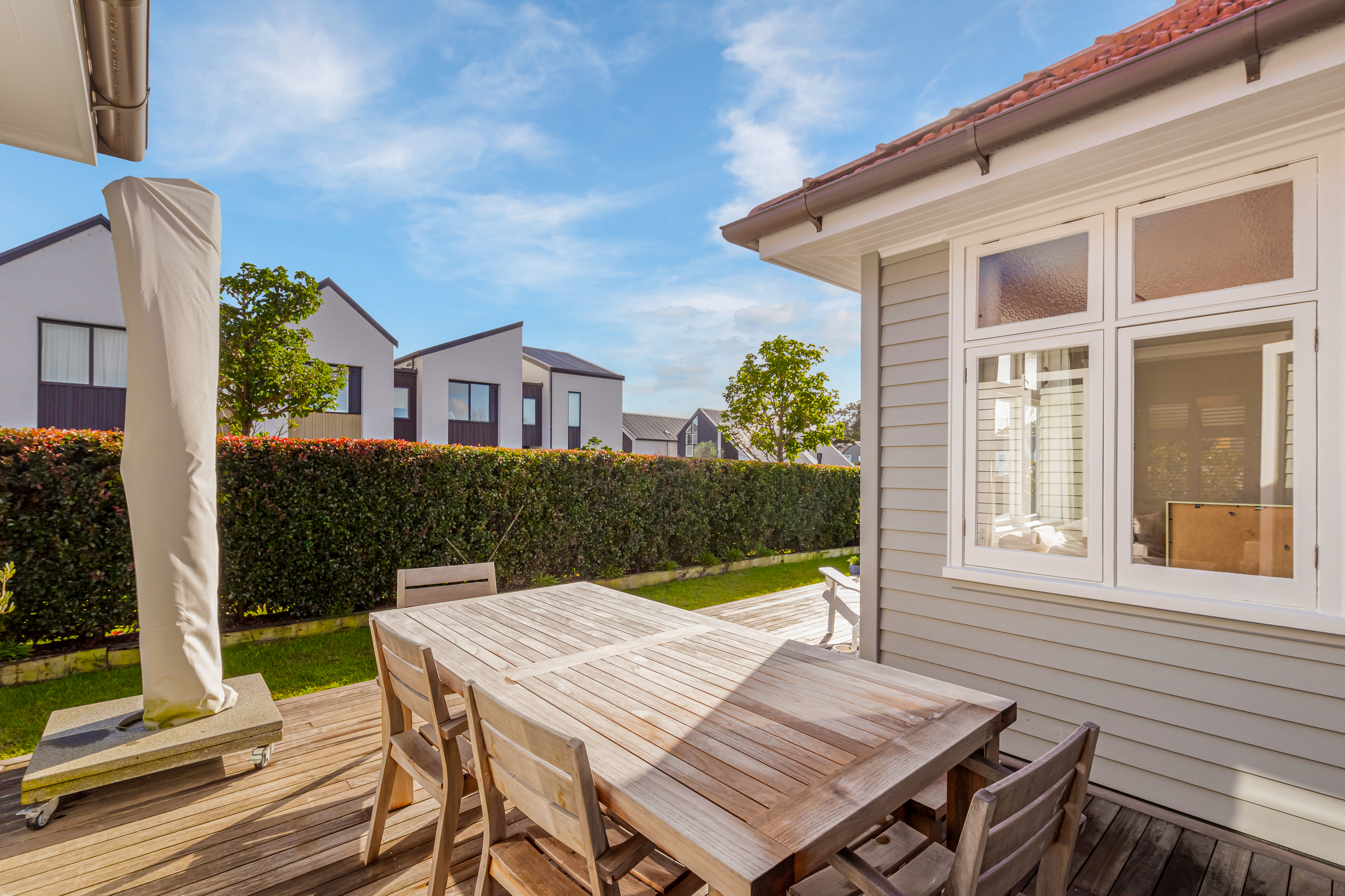 Private timber deck for outdoor dining Hobsonville Point Jev Matt