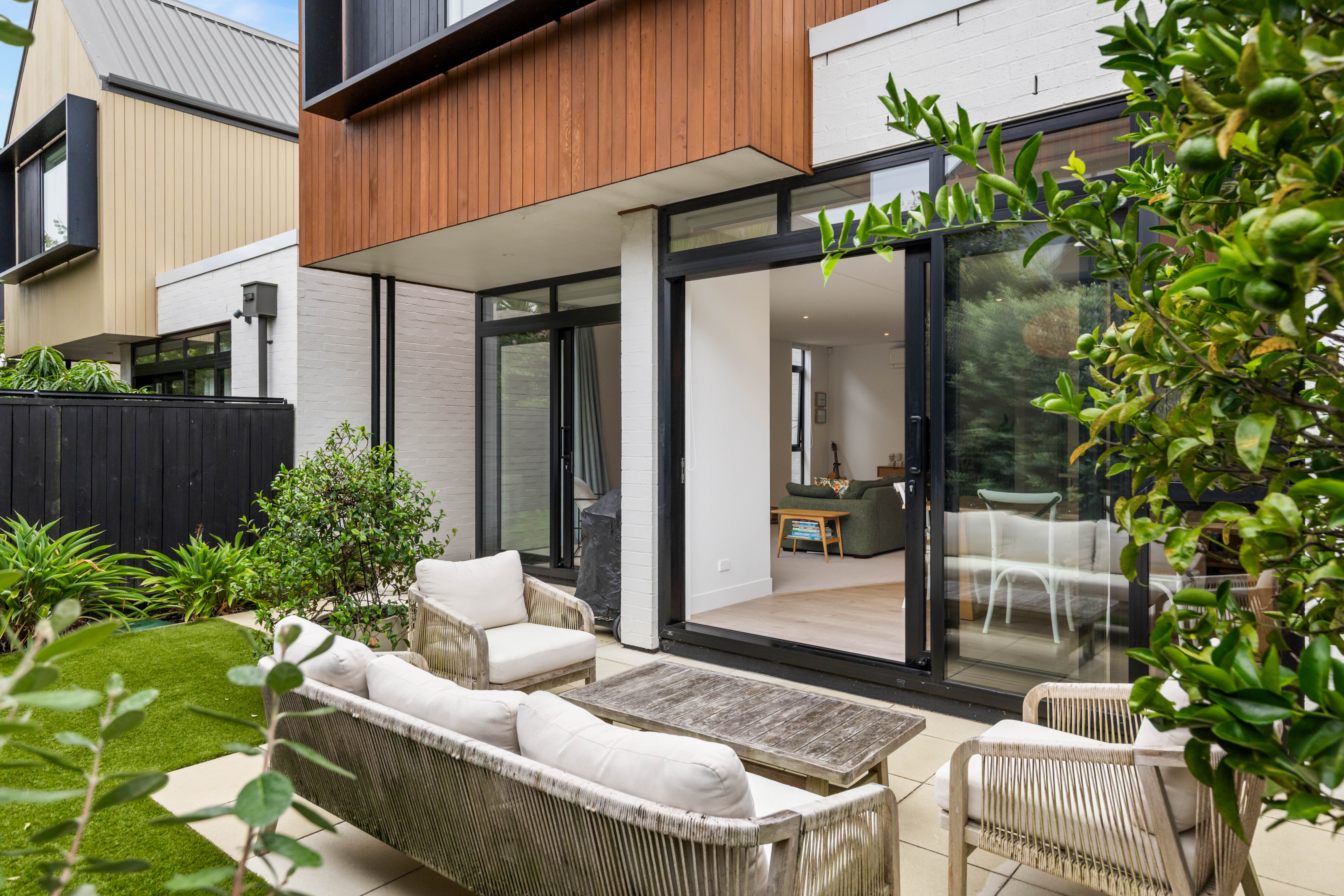 Willis Bond designed courtyard with seamless indoor outdoor connection Hobsonville Jev Matt v2.jpg